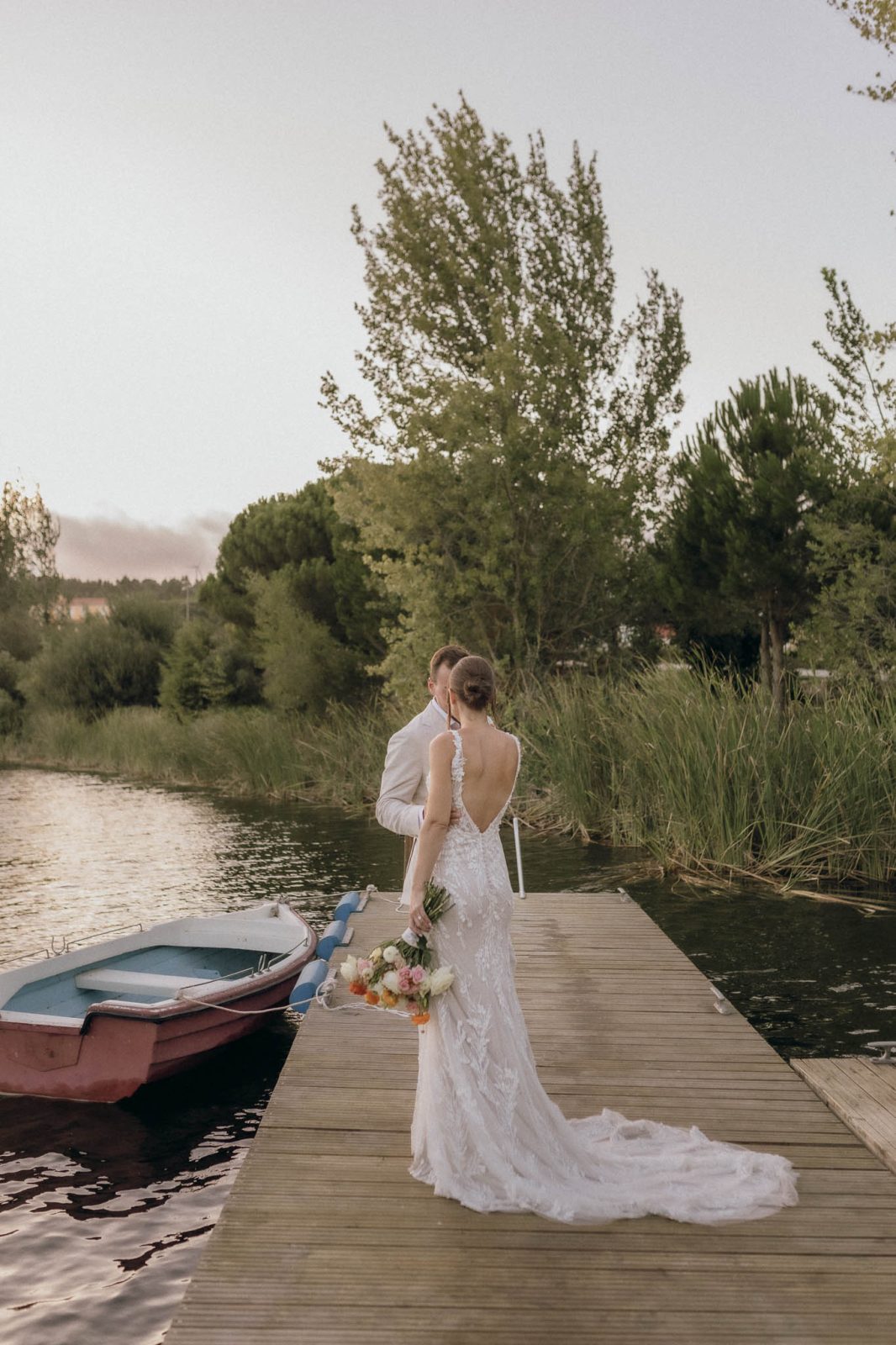 portrait of couple with bride wearing a fit and flare wedding dress